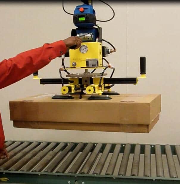 GM—gorbel Person's arm using an Intelligent Lifting Equipment