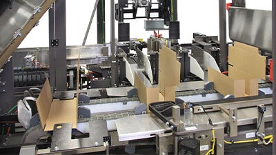 A Mach dual indexing machine assembles cartons.