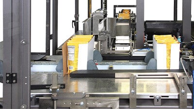 A flexible case packer is shown in action.