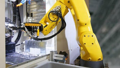 Robotic machine tending