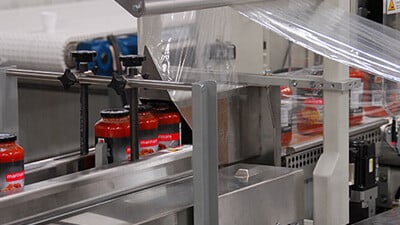 Vertical shrink sealing system