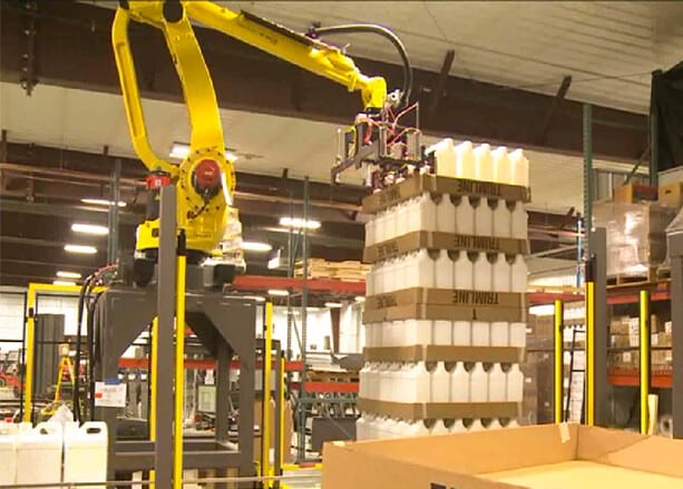 A robotic bottle depalletizer removes bottles from a pallet.