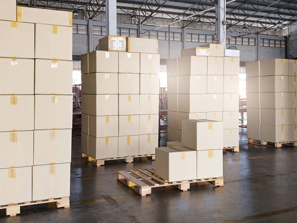 Pallets of cartons in a warehouse