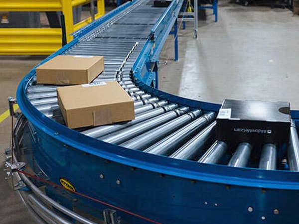 Cartons on a live roller conveyor